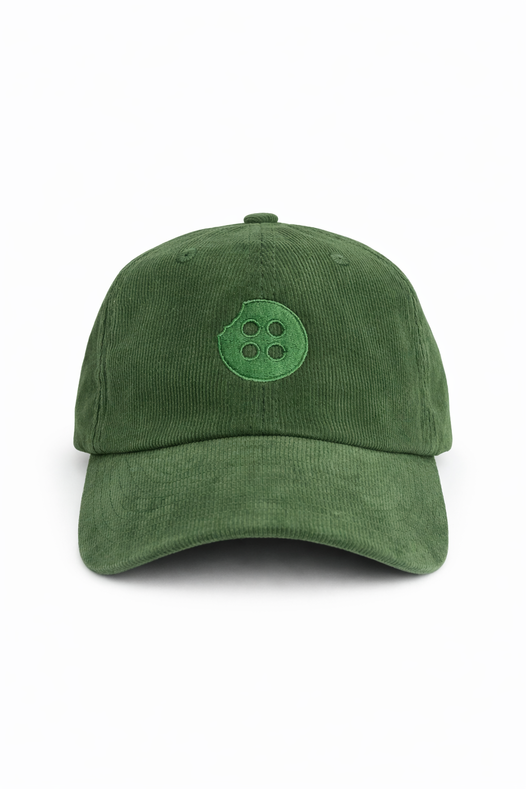green corduroy cap with embroidered Factory Coffee button logo on studio white background